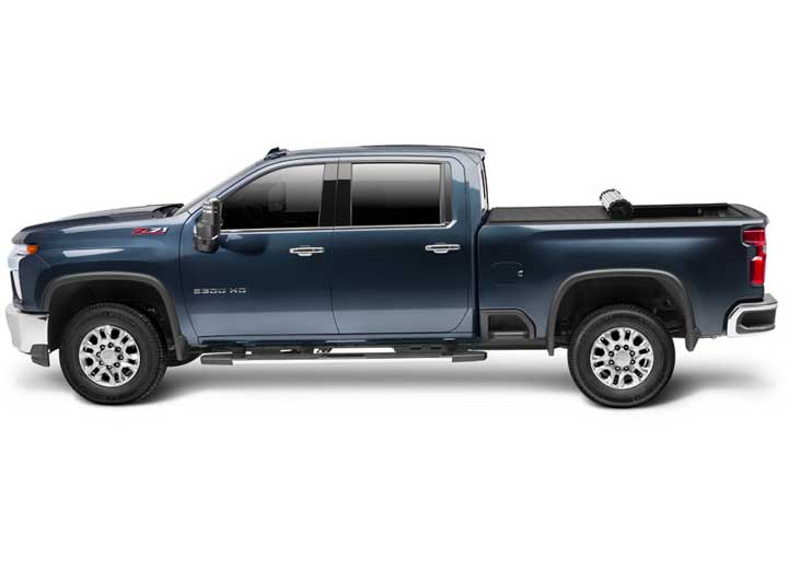 TruXedo Sentry hard roll-up tonneau cover rolled partway open over the bed of a pickup truck, side profile