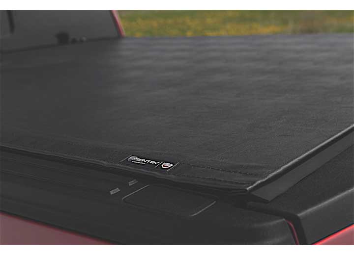 Close-up of the top edge of the side rail running away along the closed cover on a TruXedo Sentry hard roll-up tonneau cover