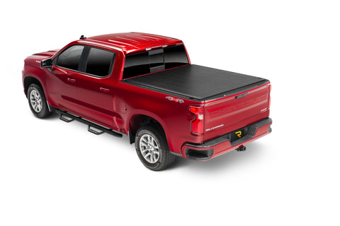 TruXedo TruXport soft roll-up tonneau cover closed over the bed of a pickup truck, widest view