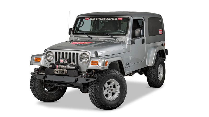 Warn Rock Crawler Front Full Width Bumper for 1997-2006 Jeep Wrangler, installed on a silver Jeep Wrangler TJ