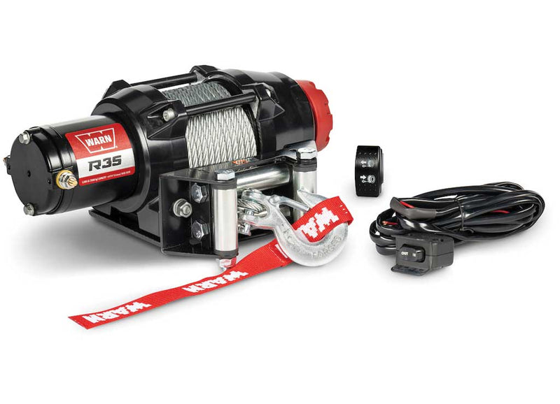 Warn R35 winch with steel wire rope and roller fairlead, shown with the included remote, switch and wiring