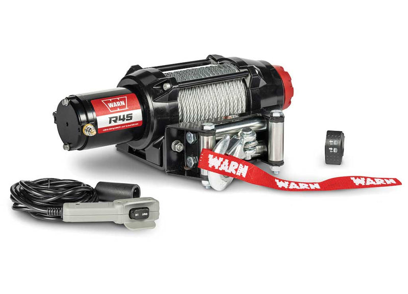 Warn R45 winch with steel wire rope and roller fairlead, shown with the included remote, switch and wiring