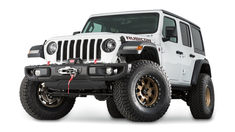 Warn Winch Mounting Plate for 2020-2026 Jeep Gladiator / 2018-2026 Jeep Wrangler, shown on a Jeep Wrangler with the winch mounted behind the factory bumper