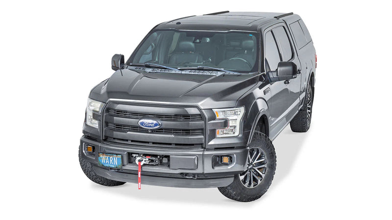 Warn Fully Hidden Winch Mount Kit for 2019-2023 Ford F-150, shown installed on a Ford F-150