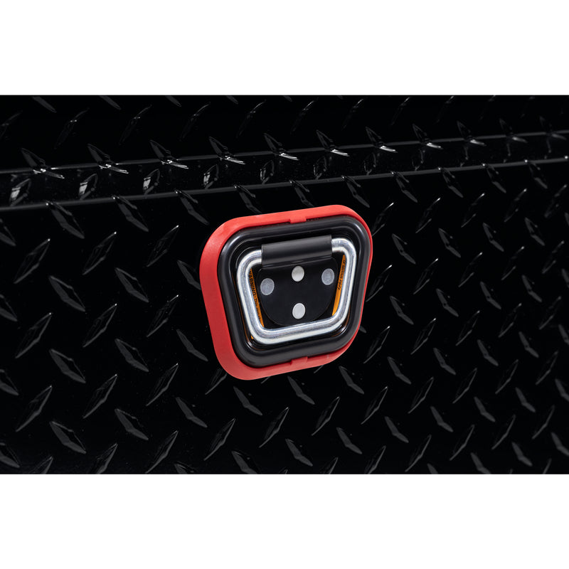 Weather Guard 121-5-04 crossover saddle box in gloss black, close-up of the reinforced tie-down buckle on the body