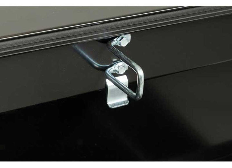 Weather Guard 126-5-03 steel crossover saddle truck tool box in gloss black, tie-down buckle detail