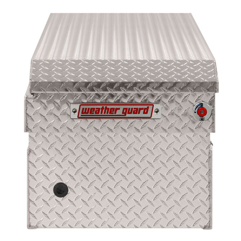 Weather Guard 127-0-04 crossover saddle box in bright aluminum diamond plate, side profile showing the body depth and the bed-rail notch