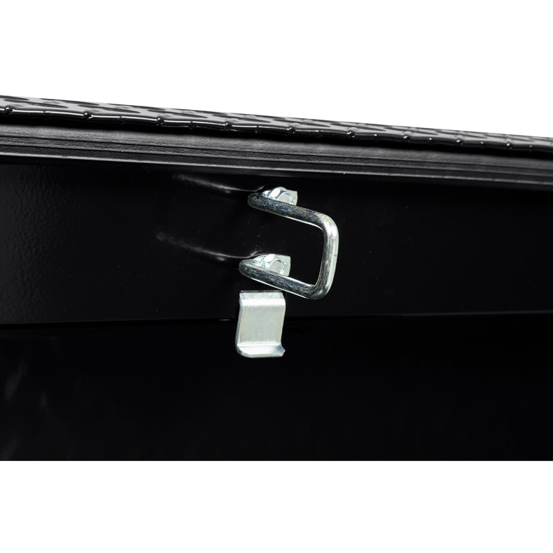 Weather Guard 127-5-04 crossover saddle box in gloss black, close-up of the latch striker plate