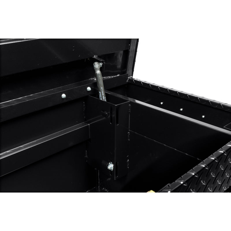 Weather Guard 127-5-04 crossover saddle box in gloss black, close-up of the welded gas strut shield inside the body
