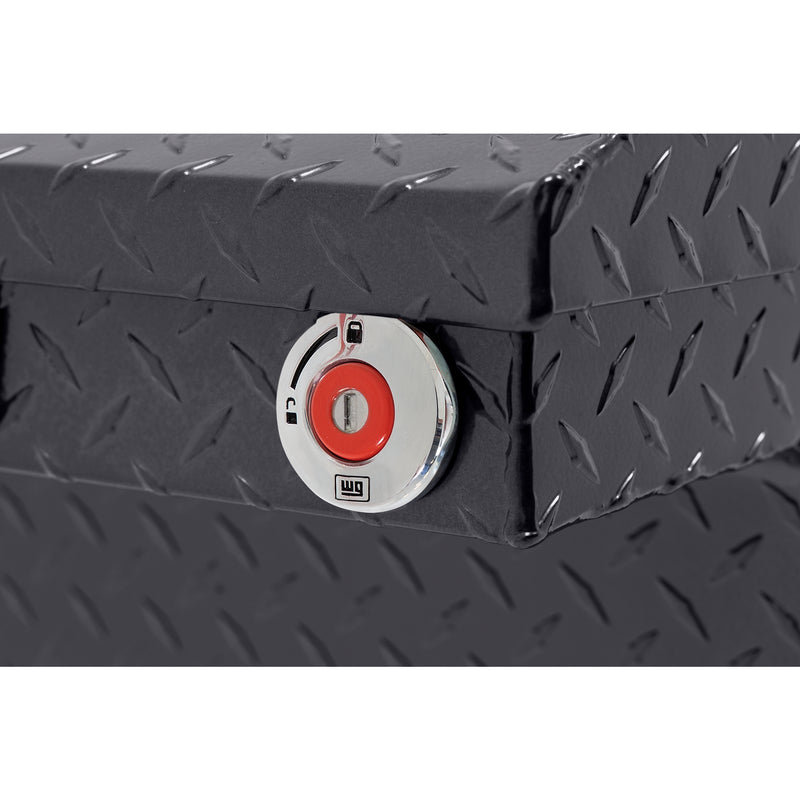 Weather Guard 131-6-04 crossover saddle box in gunmetal gray, close-up of the red push-button lock and Weather Guard badge