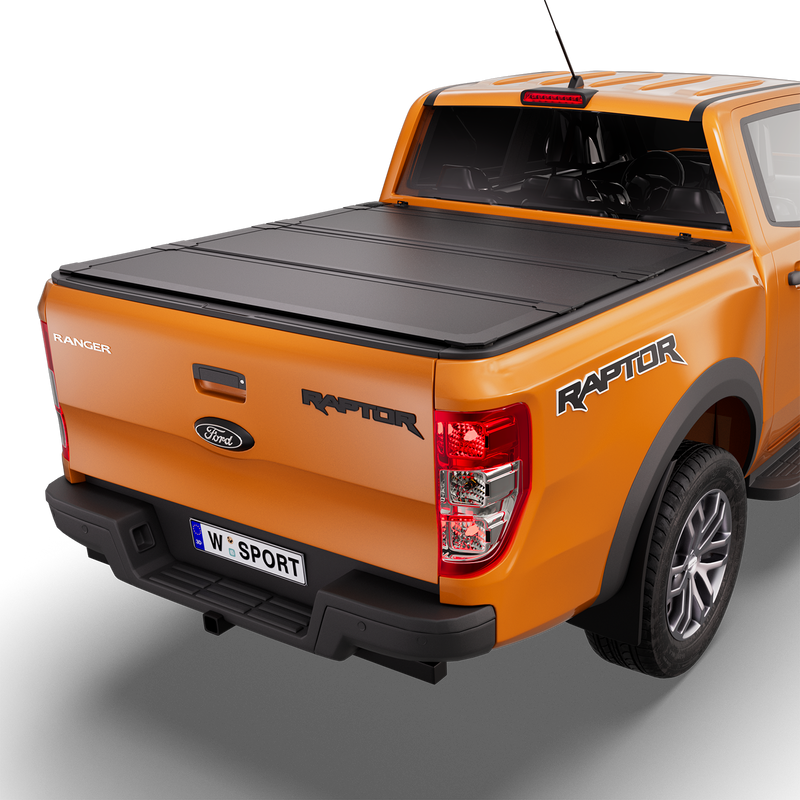 Worksport NEXUS hard folding tonneau cover on a pickup: 3D studio render of an orange Ford Ranger from the rear quarter with a black NEXUS hard folding tonneau cover closed, all three panels flat over the bed