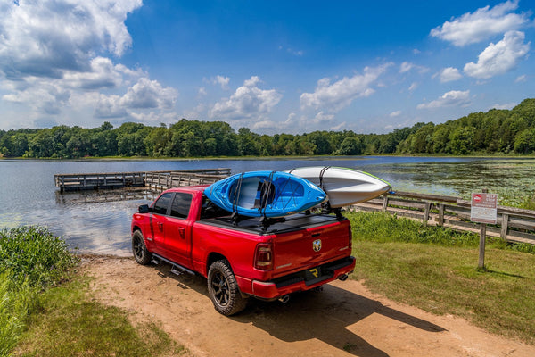 Red 2022 Ram 1500 with a RetraxPRO XR retractable cover and T-slot rails