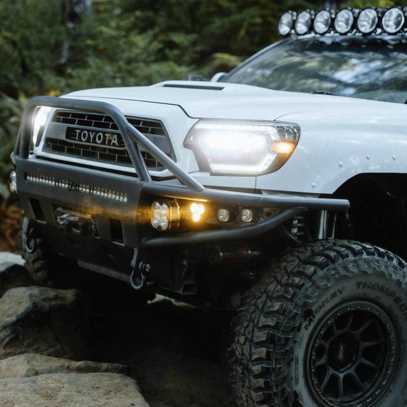 KC HiLiTES FLEX ERA 3 Dual-Mode SAE Fog Light Master Kit, Toyota Tacoma with FLEX ERA 3 Dual-Mode lights in an aftermarket bumper