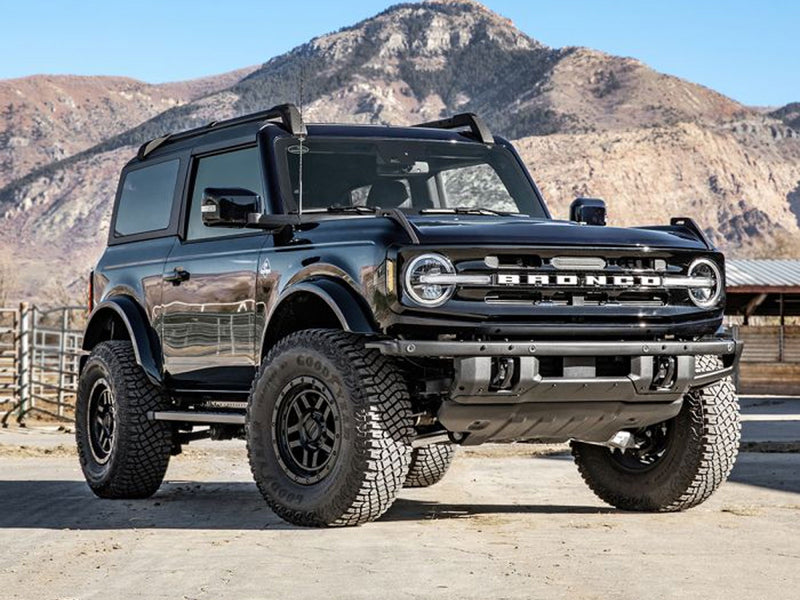 ReadyLIFT 2" SST Lift Kit installed on a black 2021+ Ford Bronco two-door, front three-quarter view
