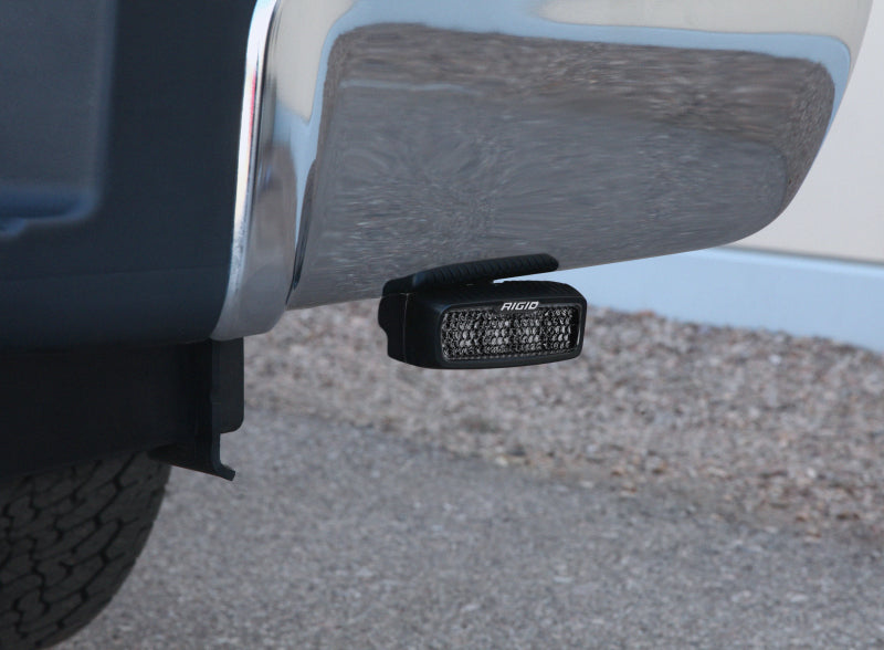 Rigid SR-Q Series PRO Spot Diffused Midnight pod mounted under a truck rear bumper