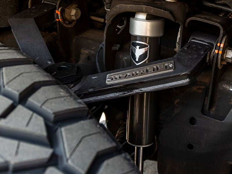 ReadyLIFT 6" Suspension System With Falcon Shocks installed, shock and upper control arm in the front wheel well