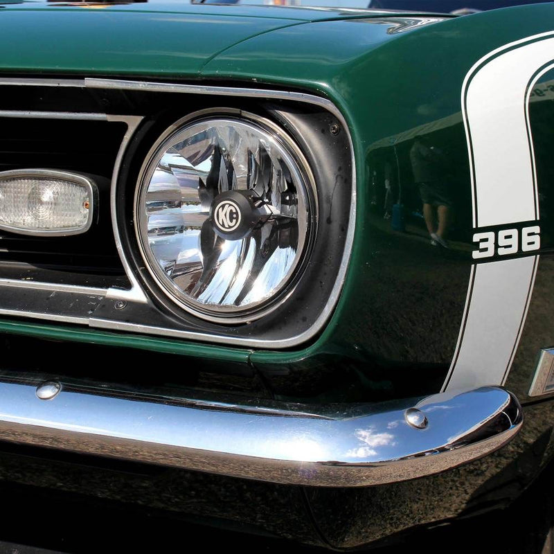 KC HiLiTES 7" Gravity LED DOT Headlight (H4 plug), classic green muscle car fitted with a KC 7 inch Gravity LED DOT headlight