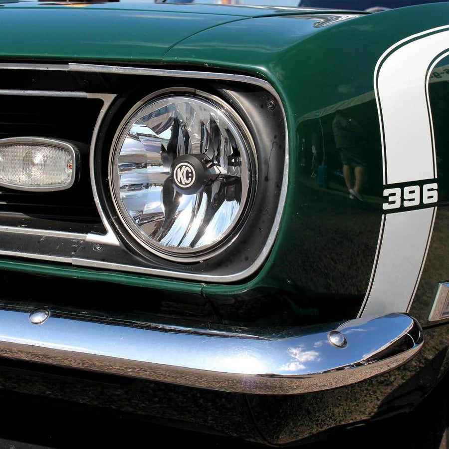KC HiLiTES 7" Gravity LED DOT Headlight (H4 plug), classic green muscle car fitted with a KC 7 inch Gravity LED DOT headlight