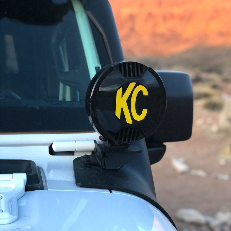 KC HiLiTES SlimLite 6" LED Light Shield, black SlimLite hard cover fitted to a light on a Jeep A-pillar