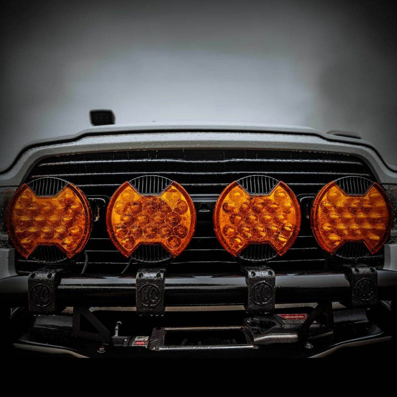 KC HiLiTES SlimLite 8" LED Light Cover & Shield, four amber SlimLite 8 shields on a truck front bumper