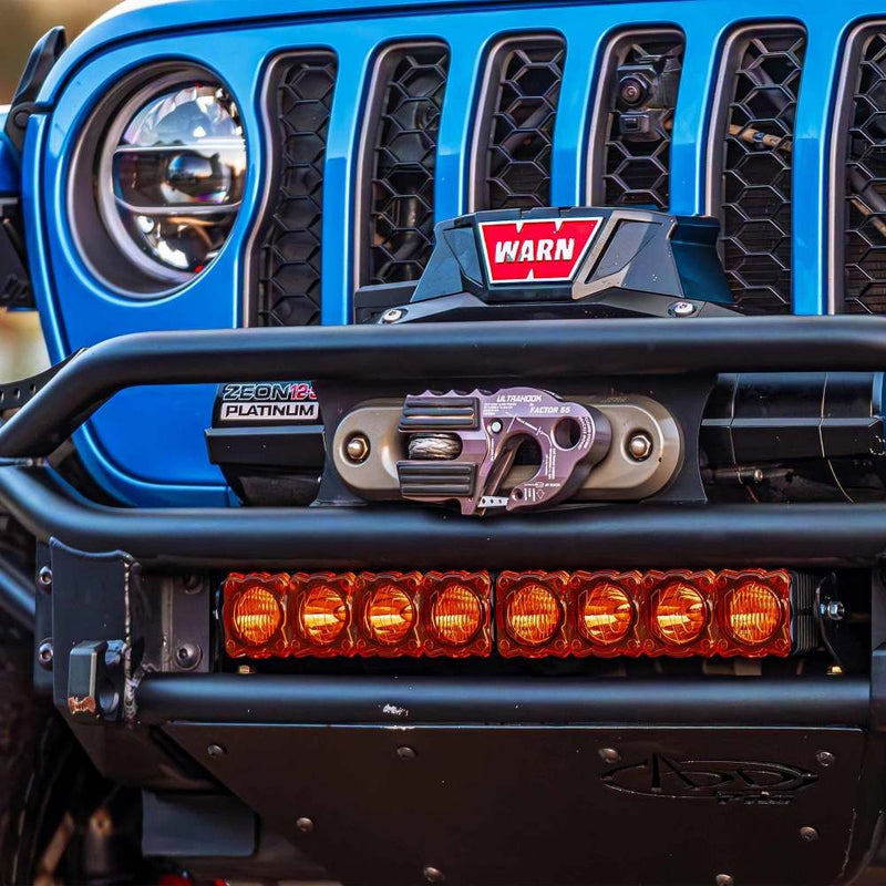 KC HiLiTES FLEX ERA LED Light Bar 10" Cover & Shield, FLEX ERA light bar with amber shields in a Jeep winch bumper