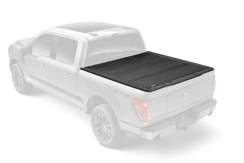UnderCover ArmorFlex hard folding tonneau cover shown closed and flush in a ghosted-vehicle illustration, rear three-quarter view, textured matte-black aluminum panels and low-profile bed rails.