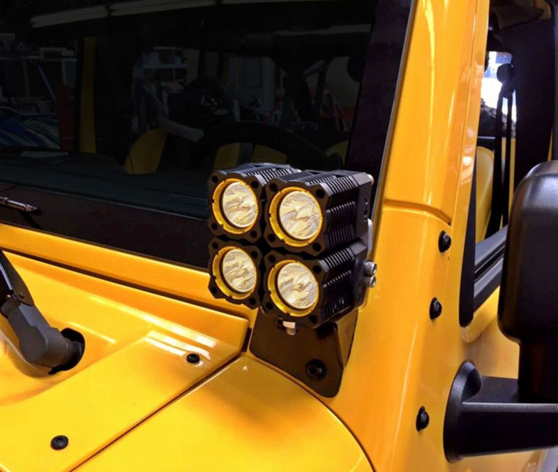 KC HiLiTES A-Pillar Cowl Light Mount Brackets, yellow Jeep Wrangler with a light on the A-pillar cowl bracket