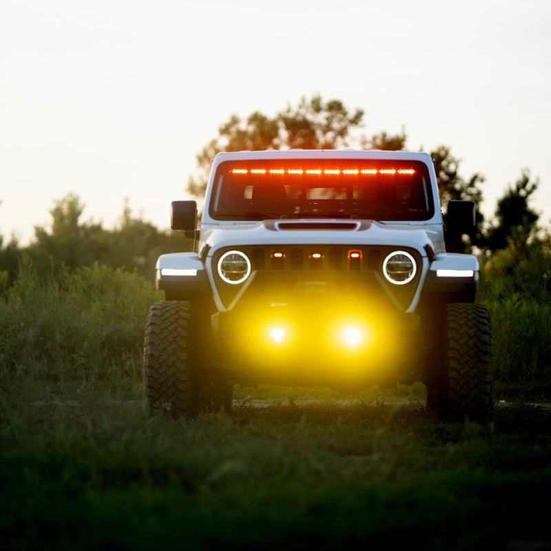 KC HiLiTES FLEX ERA 3 Dual-Mode SAE Fog Light Kit, Aftermarket Bumper, Jeep with an aftermarket bumper and both fog lights lit selective yellow