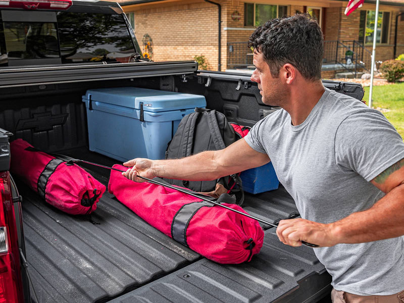 UnderCover Select part-open at the bedside while gear is secured in the open bed.