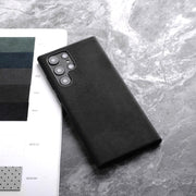 Alcantara Luxe Premium Samsung Galaxy Case Textured Finish black s25 ultra case on marble with color swatches