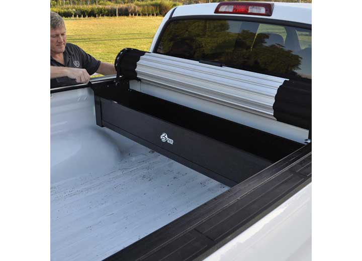 BAK BAKBox 2 shown paired with a rolled-up BAK Revolver X2 cover in a truck bed