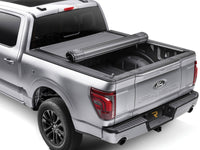BAK Revolver X4s hard roll-up tonneau cover rolled forward for full bed access