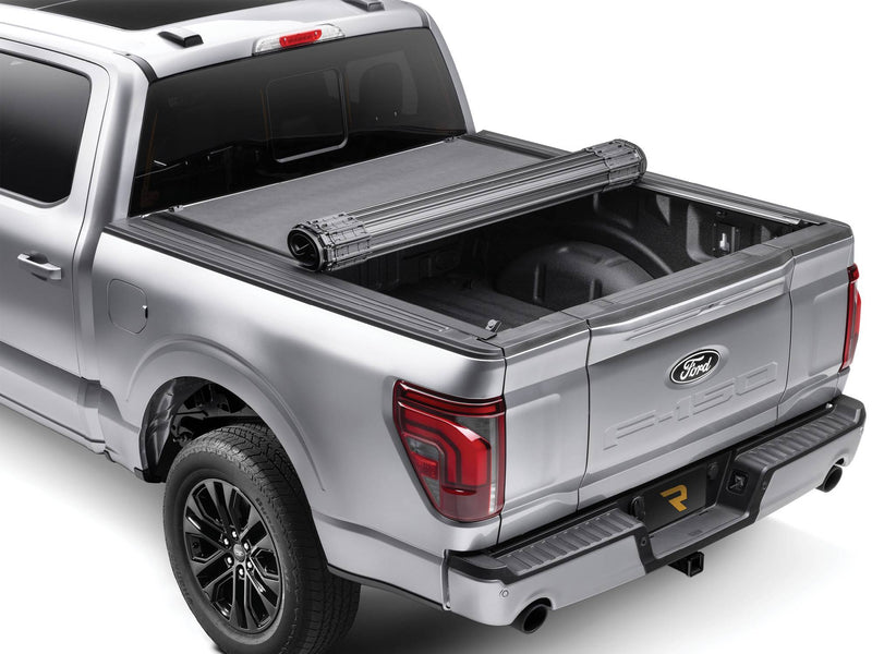 BAK Revolver X4s hard roll-up tonneau cover rolled forward for full bed access