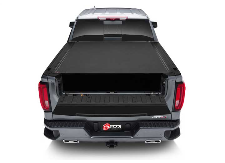 2019-2026 Chevrolet Silverado / GMC Sierra 1500 with the BAK Revolver X4s hard roll-up tonneau cover, rear head-on with the cover closed