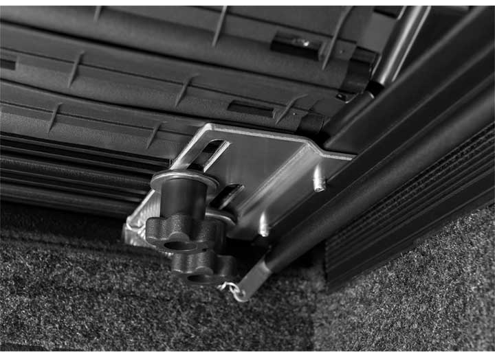 2019-2026 Chevrolet Silverado / GMC Sierra 1500 with the BAK Revolver X4s hard roll-up tonneau cover, close-up of an interlocking aluminum slat