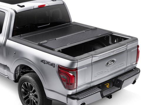 BAKFlip F1 Hard Folding Tonneau Cover on a Toyota Tundra / Tundra with the factory deck-rail system