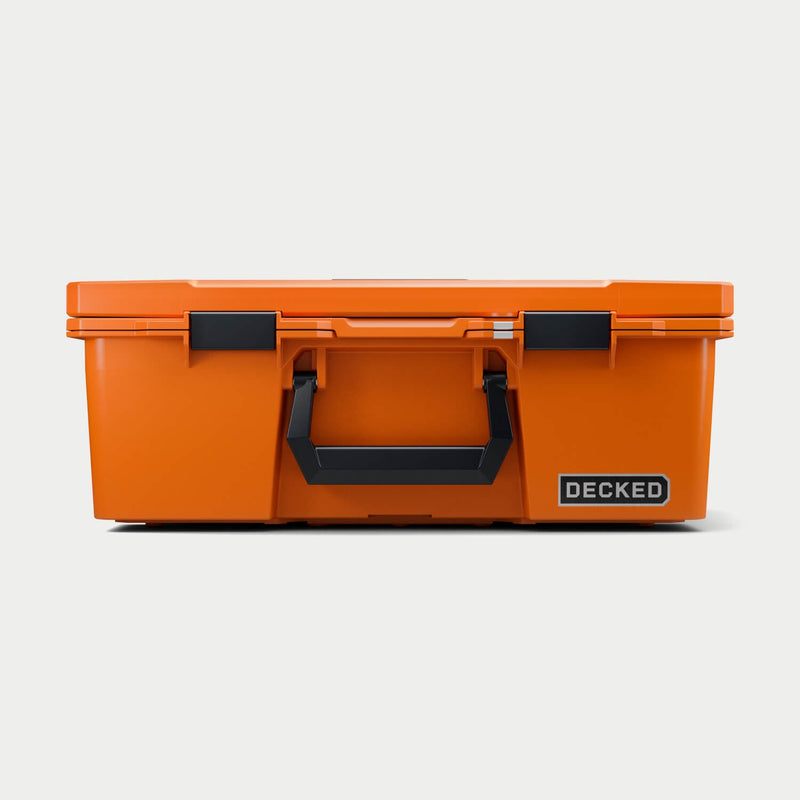 Straight-on front view of the closed Blaze Orange DECKED Halfrack 32 showing the bail handle and both latches