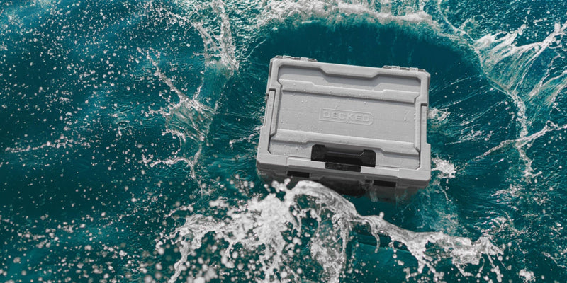 Cool Gray DECKED Halfrack 32 closed and taking water from above, showing the sealed lid