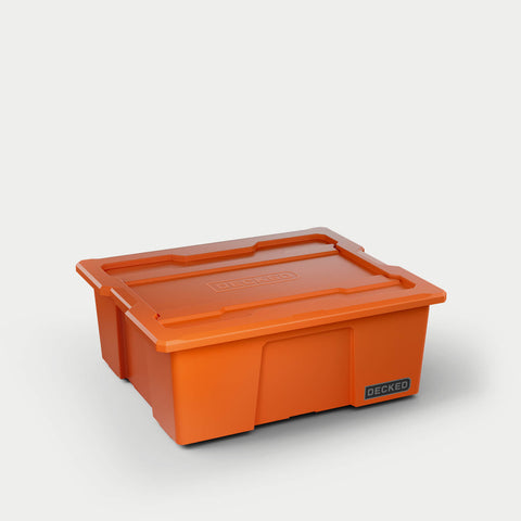 Blaze Orange DECKED Payloader 32 bin with its snap-on lid fitted, three-quarter studio view