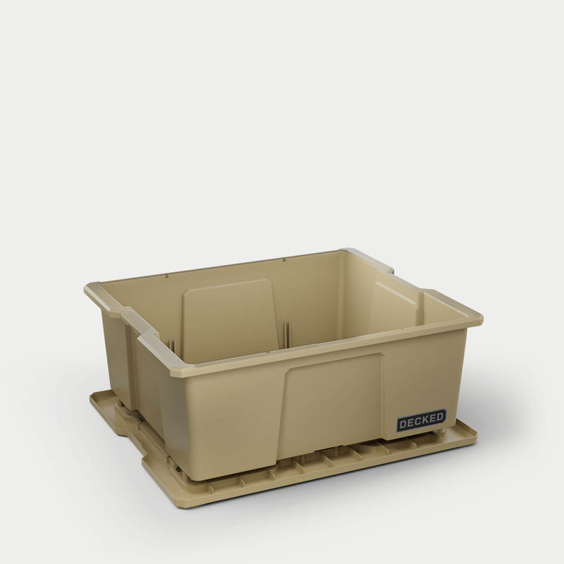 Desert Tan DECKED Payloader 32 with the lid removed and set beneath the bin, showing the open tub