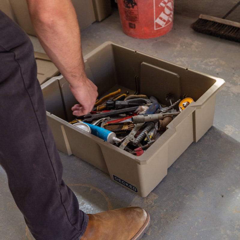 Desert Tan DECKED Payloader 32 full of hand tools on a shop floor