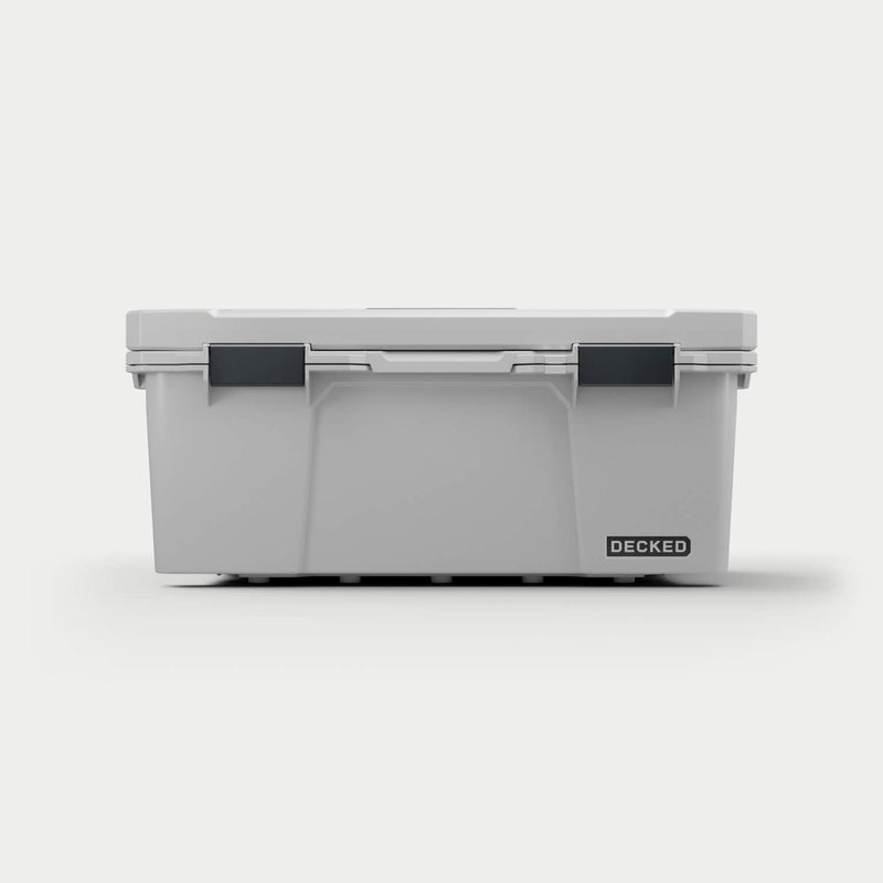 Straight-on front view of the closed Cool Gray DECKED Sixer 16 showing the lid gasket line and both latches