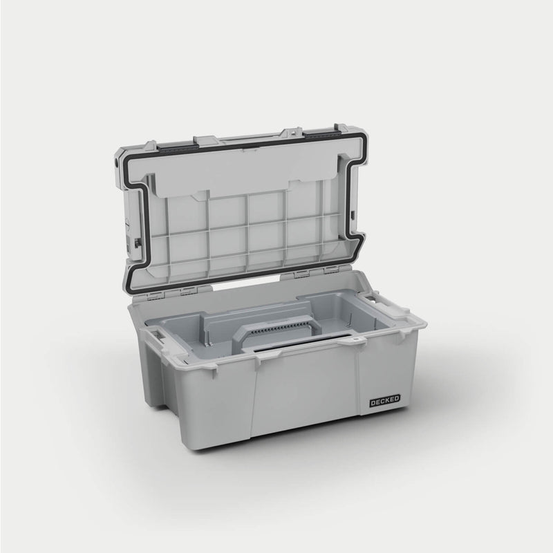 Cool Gray DECKED Sixer 16 open in a studio view with the gray removable tool tray seated in the tub