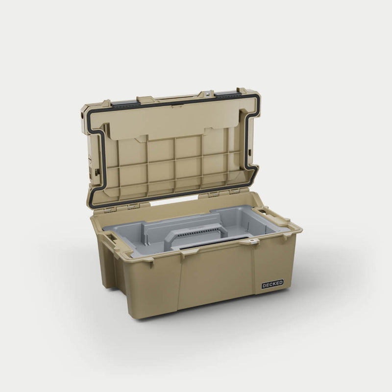 Desert Tan DECKED Sixer 16 open in a studio view with the gray removable tool tray seated in the top of the tub