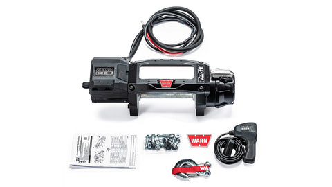 Warn ZEON XC 10 bare drum winch with an empty drum and no fairlead, shown with the corded remote, mounting hardware and manuals