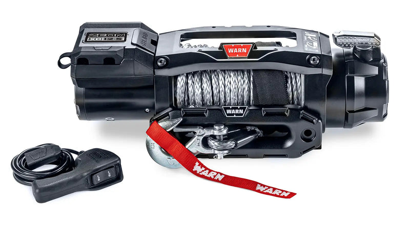 Warn ZEON XC 12-S low-profile winch, front studio view with Spydura Pro synthetic rope spooled, Epic hawse fairlead and corded remote alongside