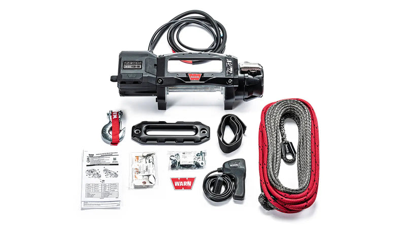 Warn ZEON XC 12-S kit laid out: winch, coiled Spydura Pro rope, Epic hawse fairlead, hook, corded remote, mounting hardware and manuals