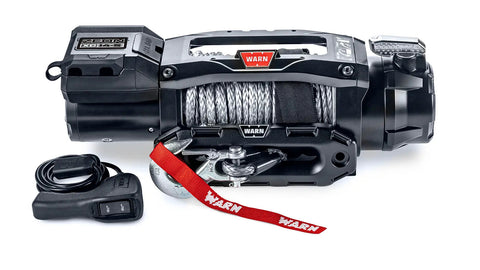 Warn ZEON XC 14-S low-profile winch, front studio view with Spydura Pro synthetic rope spooled, Epic hawse fairlead and corded remote alongside