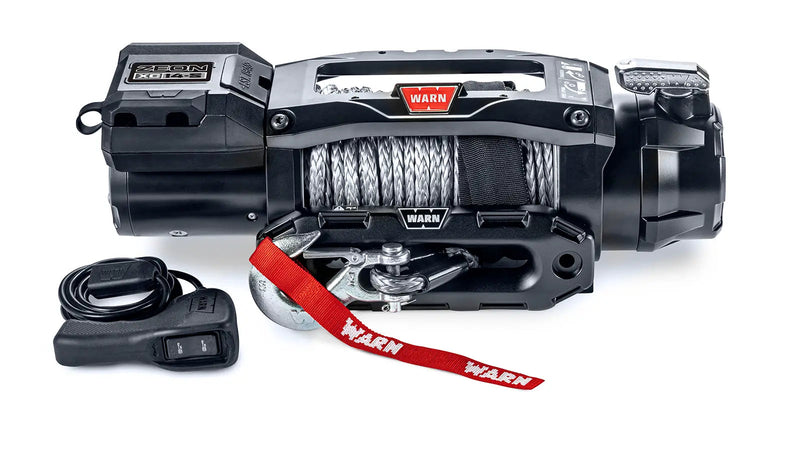 Warn ZEON XC 14-S low-profile winch, front studio view with Spydura Pro synthetic rope spooled, Epic hawse fairlead and corded remote alongside