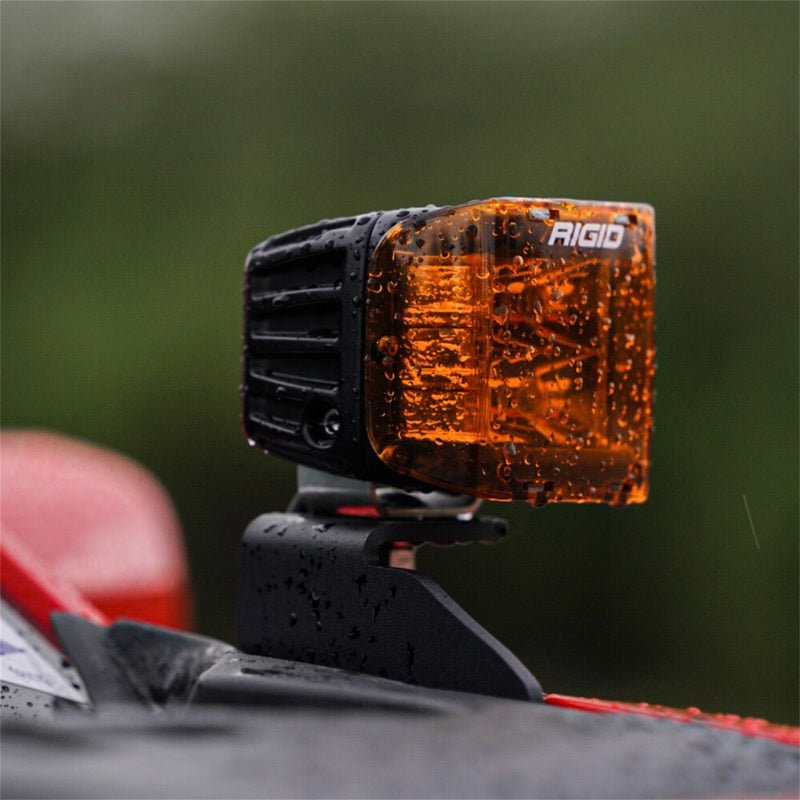 Rigid A-Pillar Mount holding a D-Series pod with amber cover on a Ford F-150